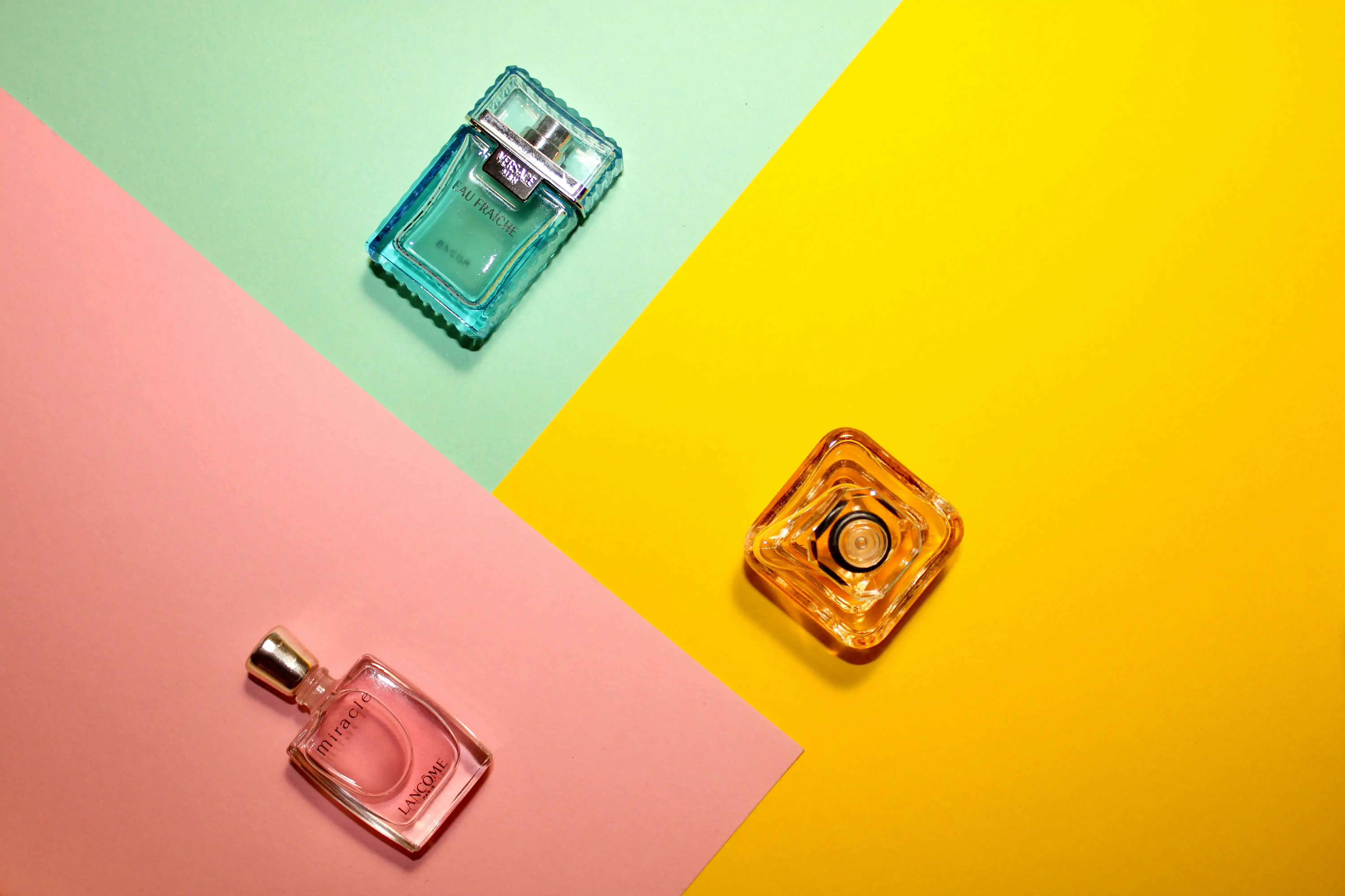 A visually appealing collage or flat lay representing different fragrance families, perhaps with corresponding ingredients or abstract colors.